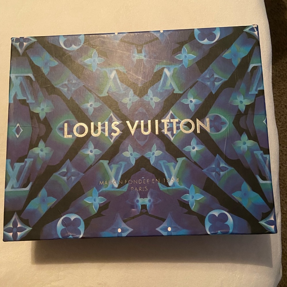 Never worn Louis Vuitton over the knee denim boots. Size 8.
